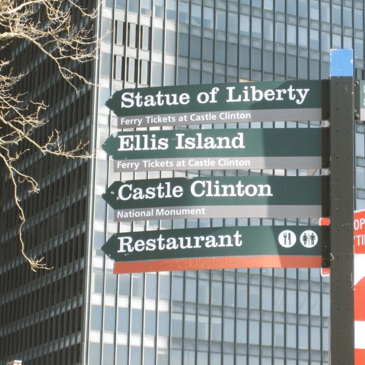 A sign leading to the Statue of Liberty and other Things To Do In Lower Manhattan