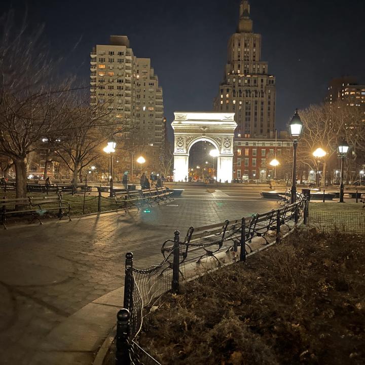 Washington Square Park and the arch lit up at night in NYC is on the itinerary for 4 days in NYC.