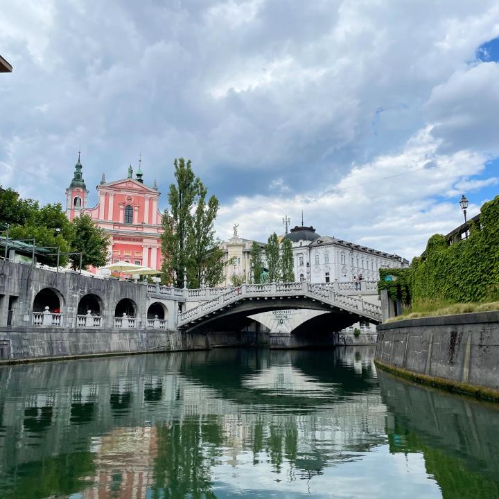 A view of the Ljubljana River crossing under the famous three bridges in Ljubljana, Slovenia