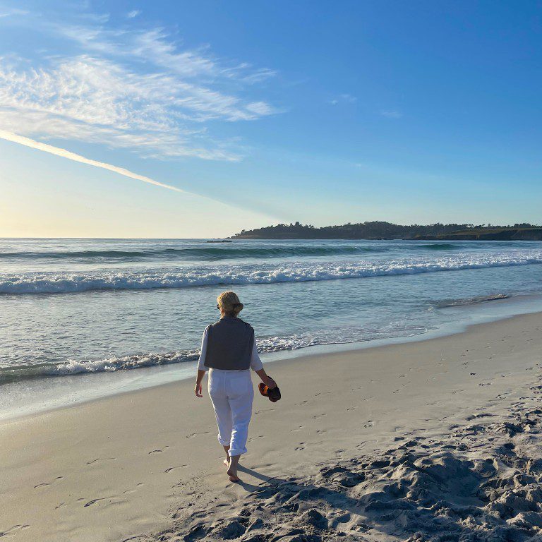Carrie walking on Carmel Beach
