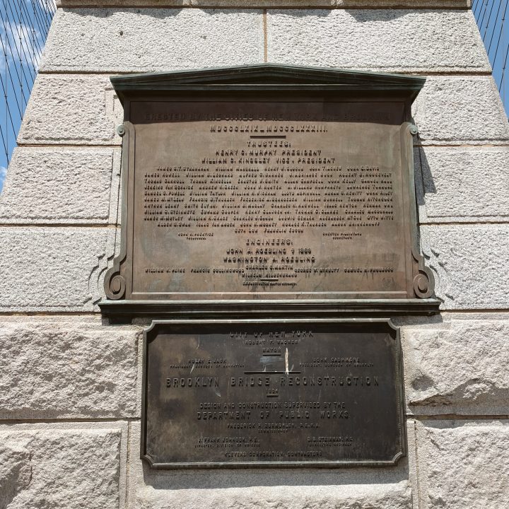 A plaque on the Brooklyn Bridge
