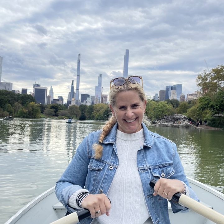 Carrie Green Zinn rowing a boat in Central Park