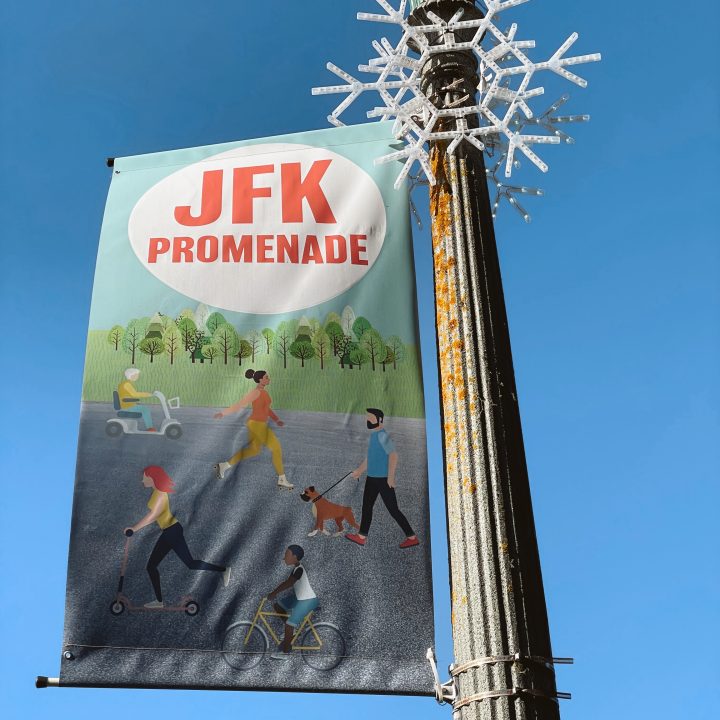 A sign for the JFK Promenade in Golden Gate Park