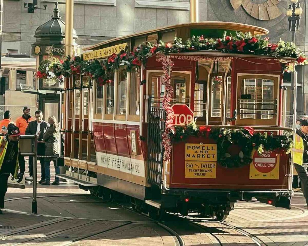 A Cable Car decorated for the holidays - take a ride on your 3 days in San Francisco