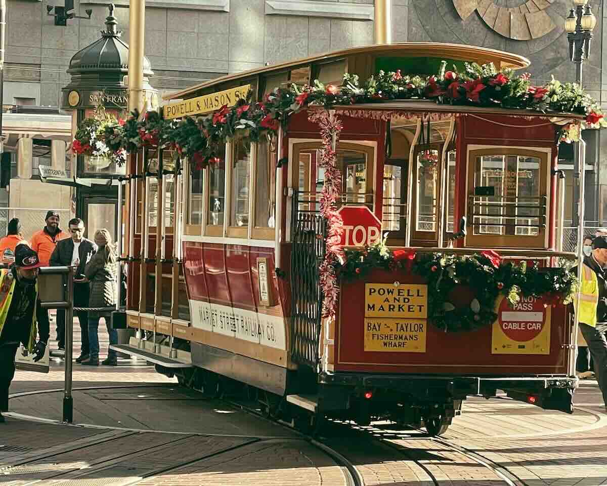 A Cable Car decorated for the holidays - take a ride on your 3 days in San Francisco