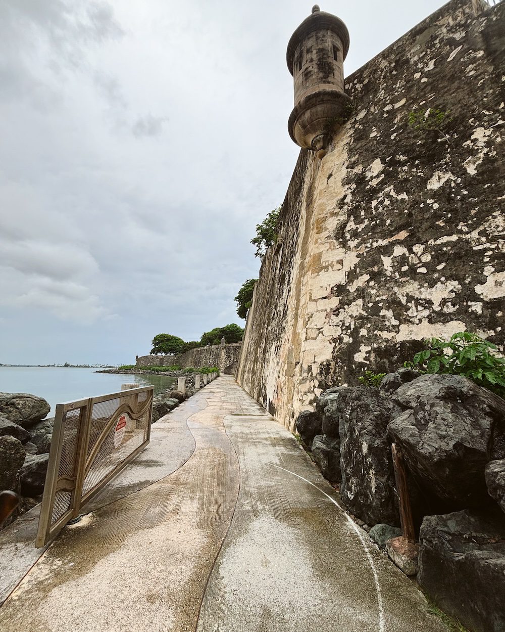 The Paseo de Princesa along the water with the walled city on one side.