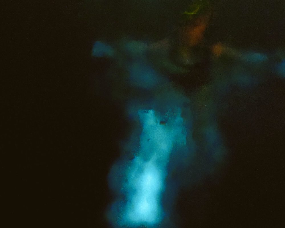 Carrie Green Zinn swimming in the La Parguera bioluminescent bay in Puerto Rico
