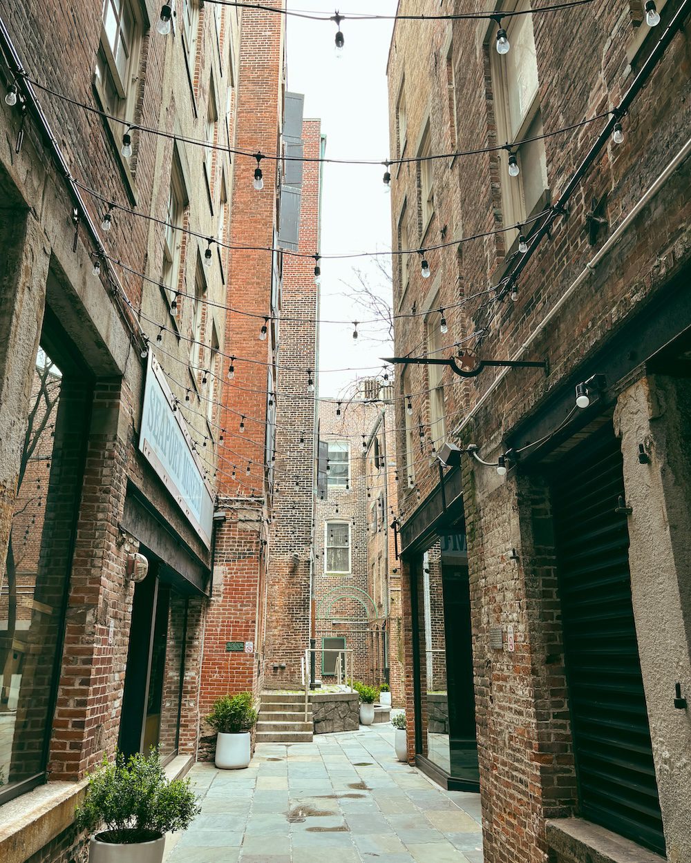 An alley at South Street Seaport in the historic brick buildings.