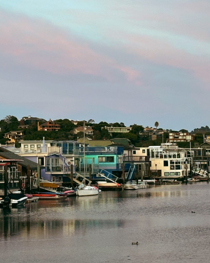 A view at sunset of some Sausalito, CA houseboats
