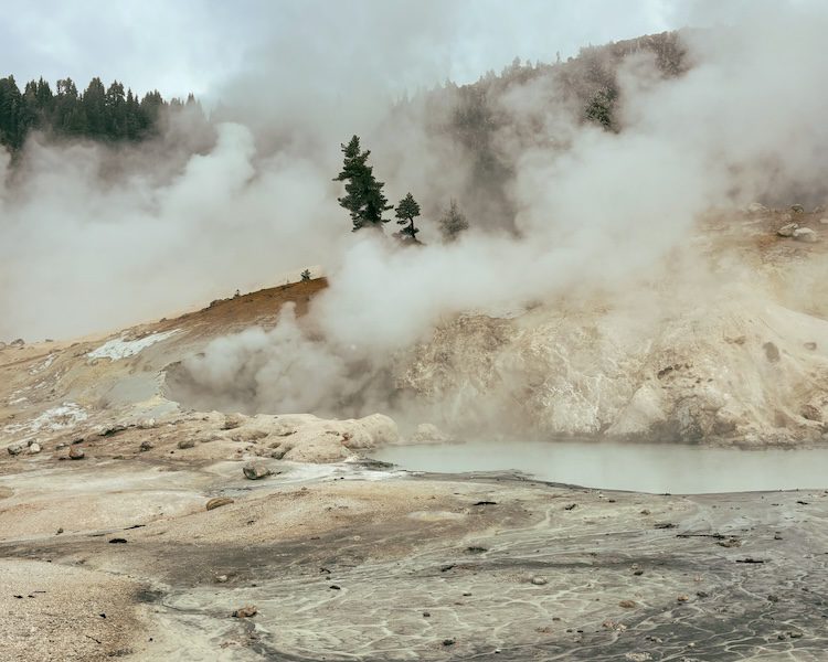 The base of Bumpass Hell trail has boiling mud and steam vents along the boardwalk.
