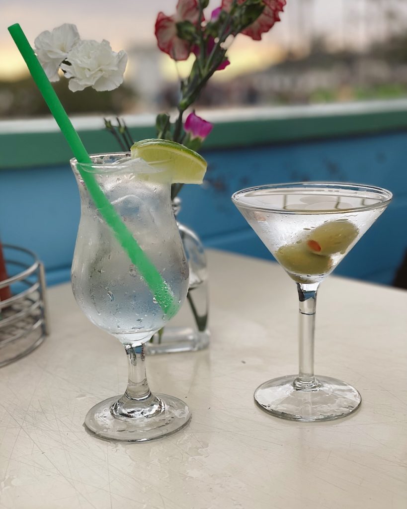 Cocktails in Laguna beach overlooking the ocean and sunset