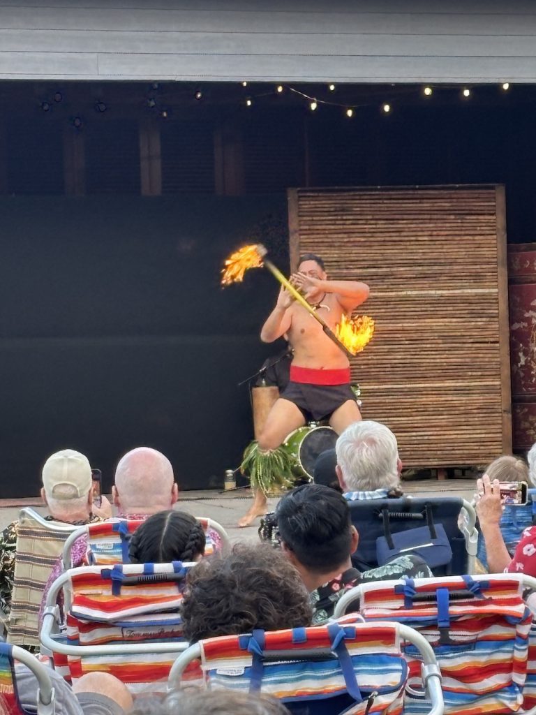 A fire dancer in the South Maui Gardens Hula Show in Wailea, Maui