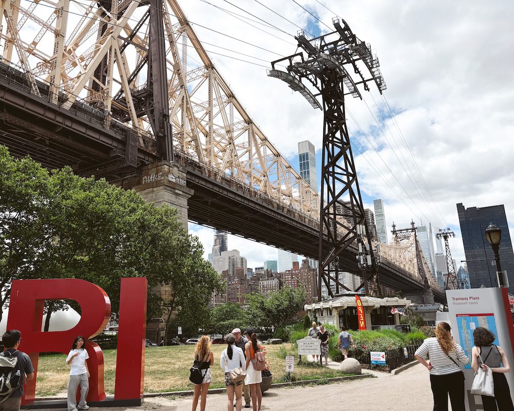 A view on Roosevelt Island of the Tramway arriving from Manhattan onto the Island. The Tram is a fun hidden gem to experience.