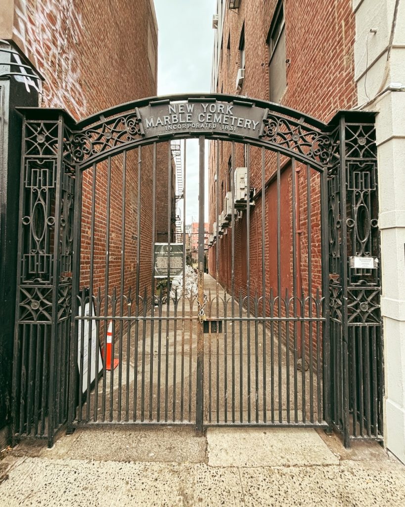 The gate entrance to the New York Marble Cemetery which is one of the hidden gems in New York.