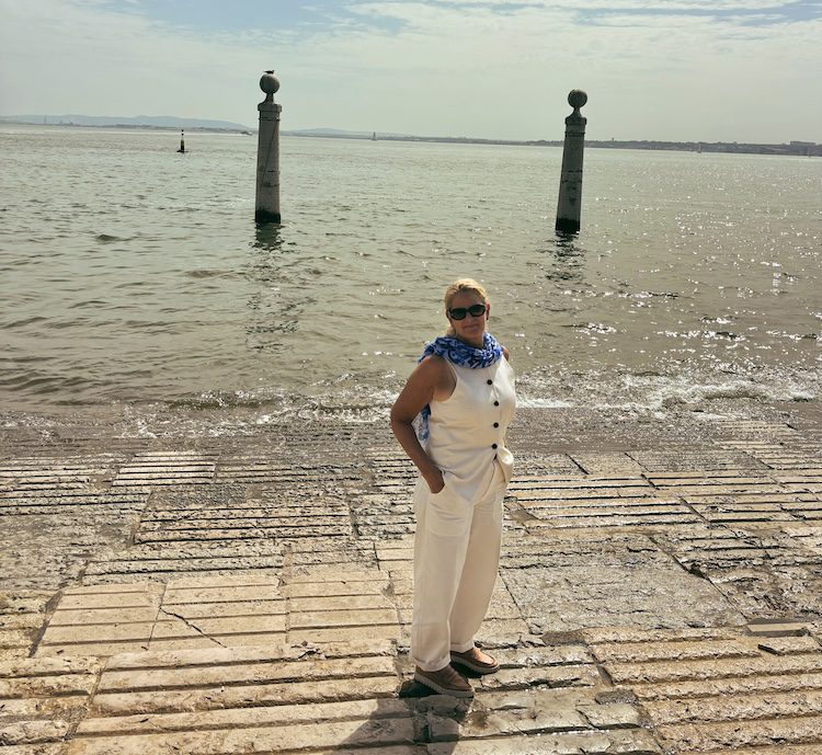 Carrie Green-Zinn by the water in Lisbon