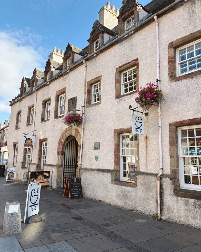 A street in Inverness with a cafe