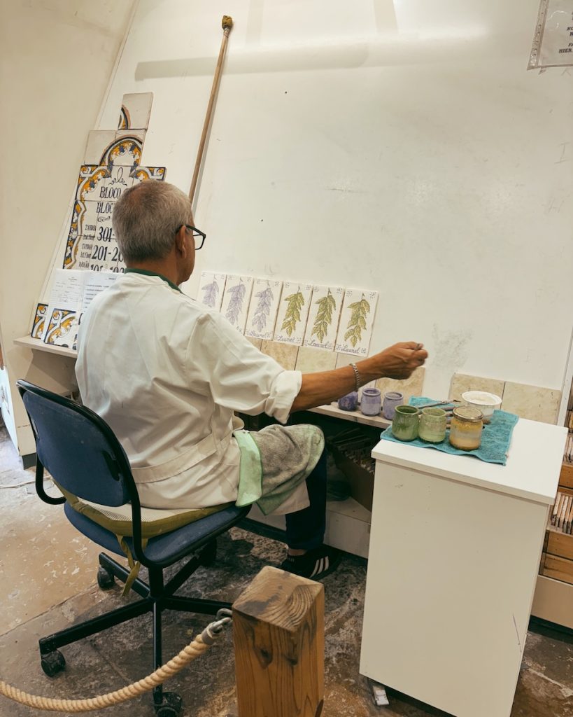 A tile painter in Lisbon.